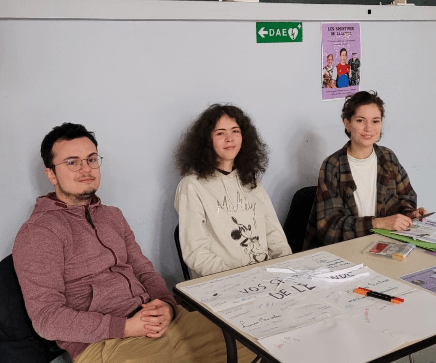Equipe bénévole lors d'une animation avec exposition durant un événement sportif
